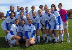 The Wildcat women's soccer team, ranked second in the Oct. 13 United States Collegiate Athletic Association poll, gathers for a group photo at an Oct. 19 match against Alfred (N.Y) University. (Photo by Kenneth L. Barto, student photographer)