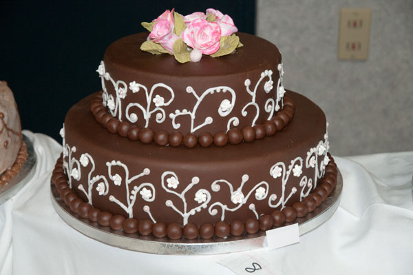 The top wedding cake was designed by Ashlee McFalls and Marlee Horchen.