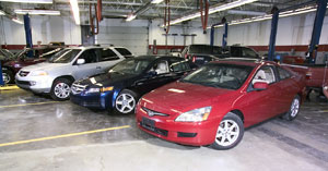 Three newly donated vehicles await PACT students.