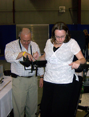 Pennsylvania College of Technology human services student Holly B. Snauffer, of Linden, tests equipment during an Assistive Technology Expo organized by students to coincide with a human services expo on the campus.