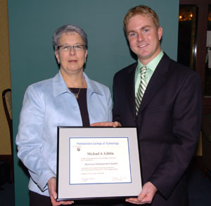 Michael A. Gibble, Alumni Achievement Award winner, with President Gilmour