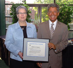 'Distinguished Alumnus' Robert G. Feaster with Davie Jane Gilmour, Penn College president