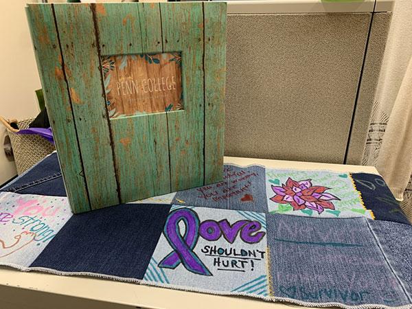 Squares will be added to the Denim Day Quilt in future years; the letters were bound and will be shared with a local shelter for survivors of domestic and sexual violence.