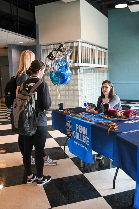 A table staffed by Meghan R. Delsite Coleman, assistant director of student engagement, promotes diversity ...