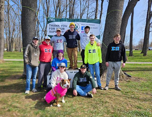 Sigma Pi members, on hand and ready to do whatever is needed, are: (front row, from left) Sands and Smith, and (others, from left) Rae, Horner, Druckenmiller, Kougoures, O’Donnell, Damico, Sheaffer and Fitzgerald.