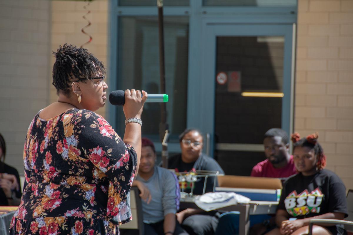 Tamaka F. Carter, a financial aid assistant and 2020 business management graduate, honors a request to sing “Lift Every Voice and Sing.” Carter, of Williamsport, is also a student in business administration: management concentration.