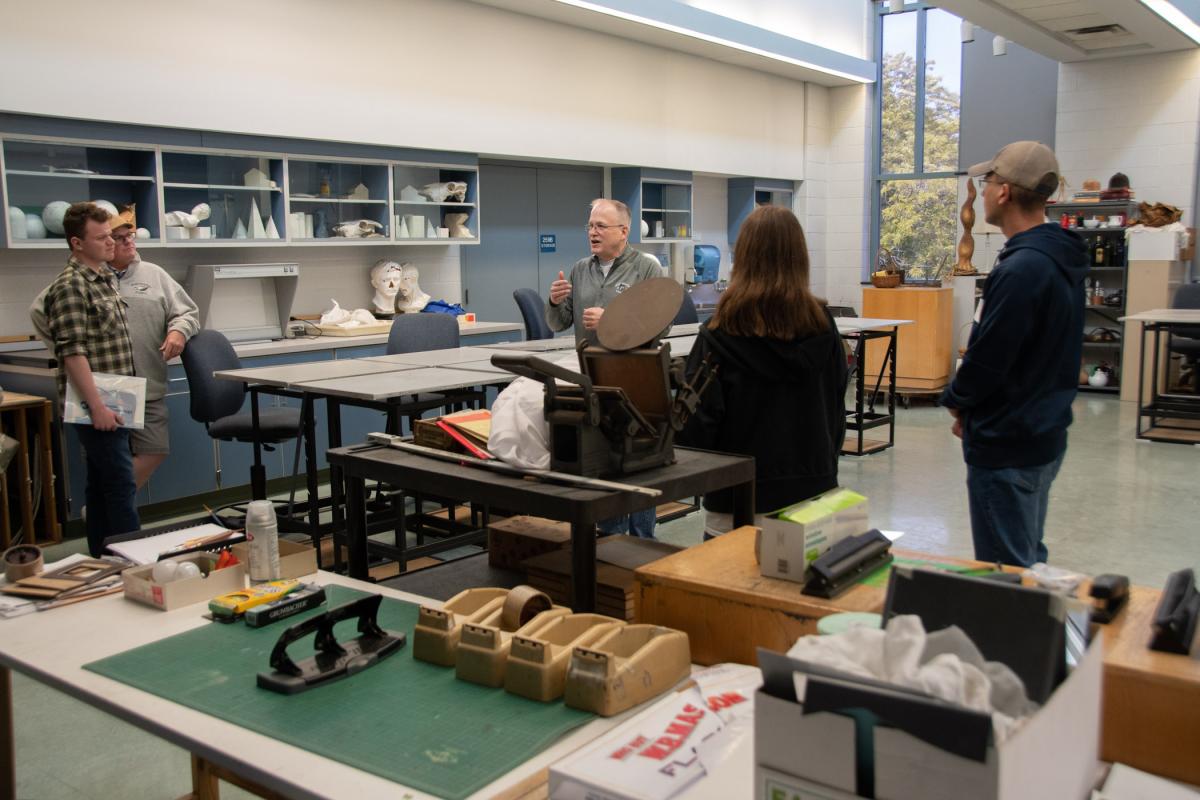 Brian A. Flynn, assistant professor of graphic design, shows the skylight-laden drawing studio.