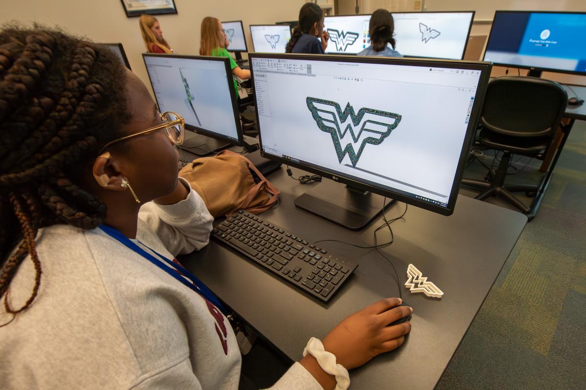 Wonder Woman cookie cutters are created in an engineering design lab.