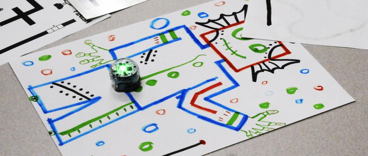 A very clever camper drew a robot on which her Ozobot would travel!
