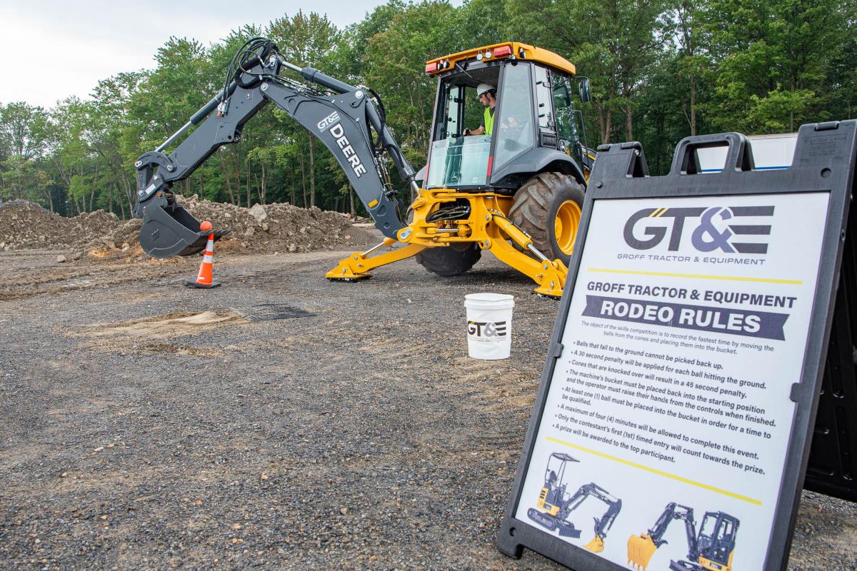 ... while another scoops a basketball in a heavy equipment “rodeo” hosted by Groff Tractor & Equipment, among the corporate partners whose generosity extended to Pre-College Programs.