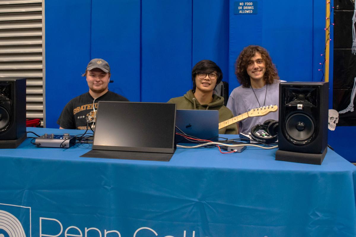 The harmonious presence of Penn College Music Makers members – Ty S. Kokoska, of Media; Niko Li Ratjavong, of Breinigsville; and Dominick P. Bozza, of Williamsport (from left) – invites Fall Fusion passersby to check out their organization.