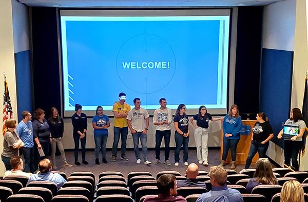 The Admissions team greets Engagement Series participants in the first-floor presentation room, making introductions and providing an overview of office operations.