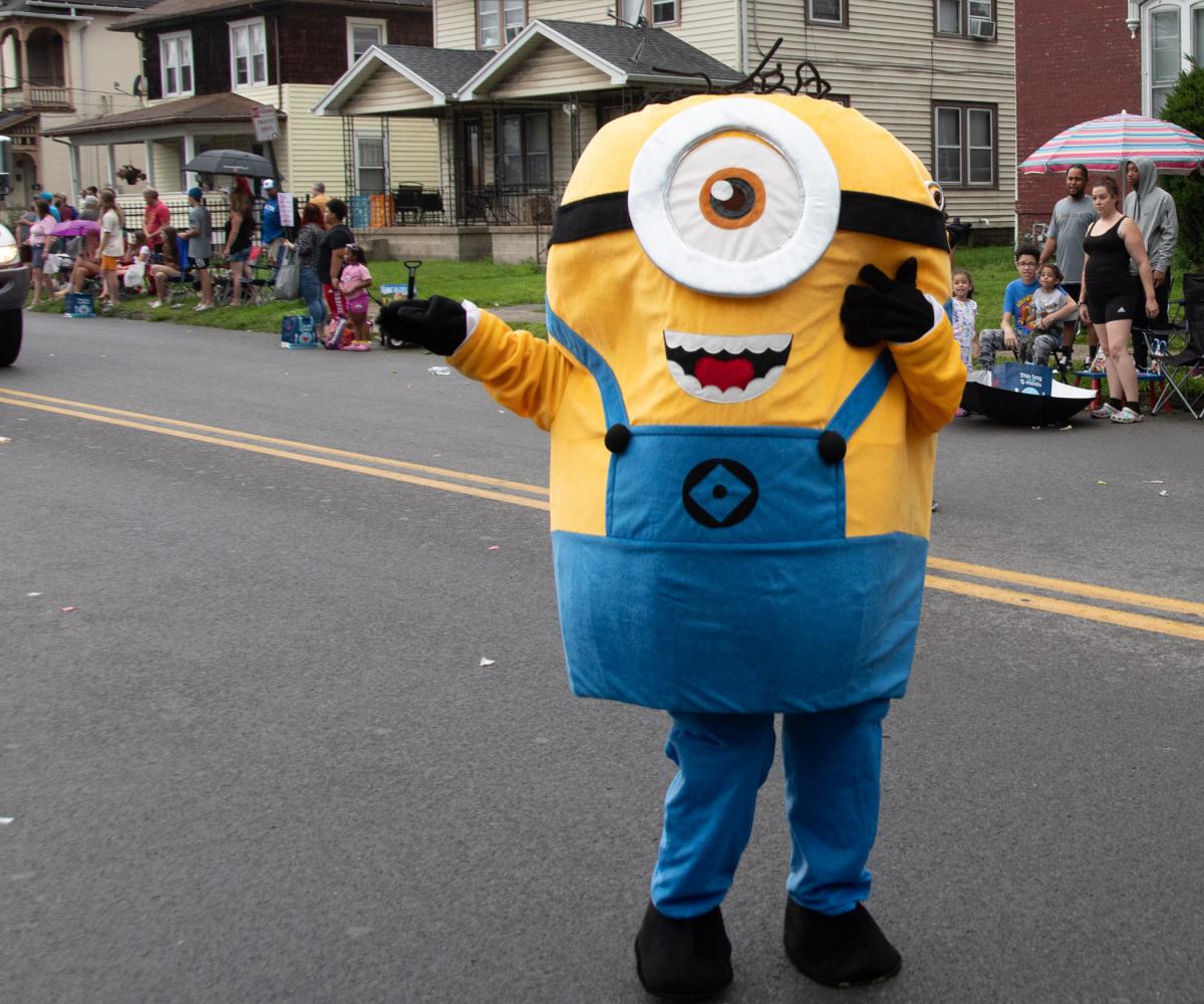 Minion Stuart marches in the parade – in search of a boss? 