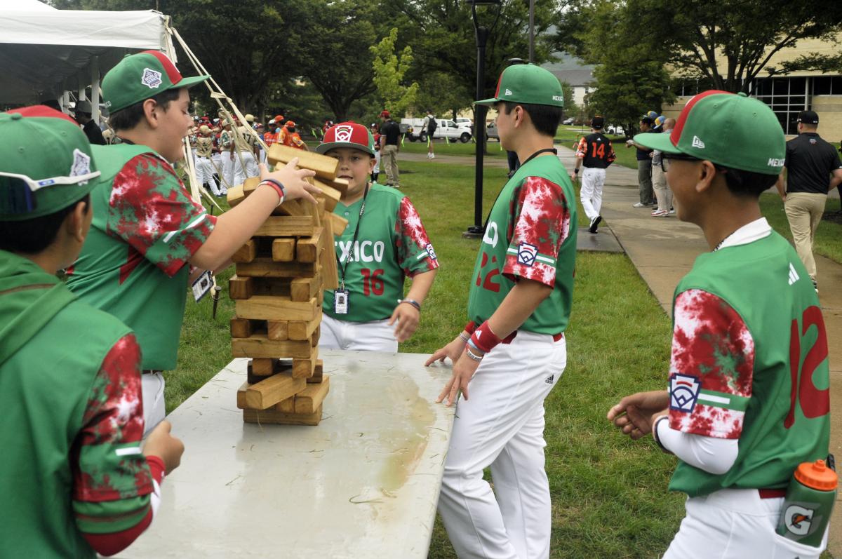 A player from Mexico gets thrown a curve, as the Jenga tower comes tumblin' down.