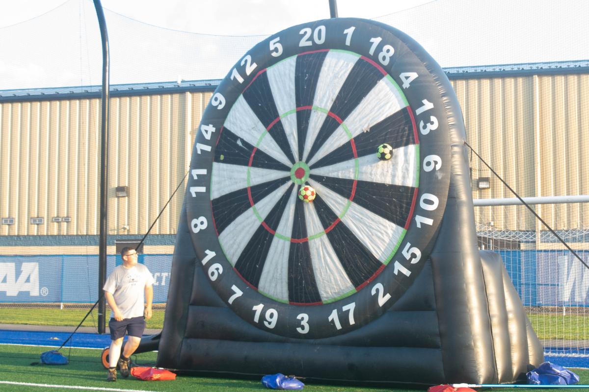 ... and answered the challenge of a soccer dartboard, among other oversized amusements.
