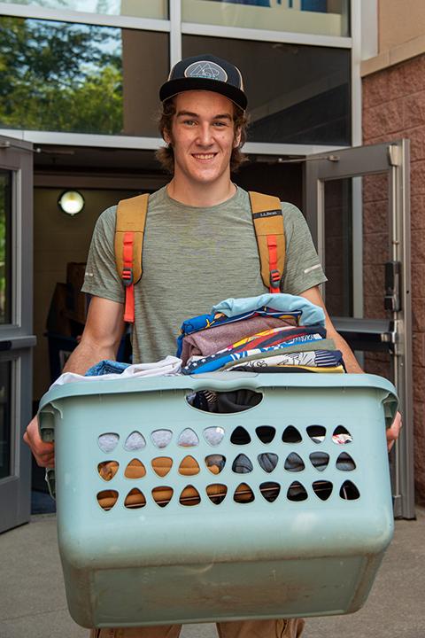 Stocked up on clean, folded laundry to start the semester is new mechatronics student Zeke M. Foy, of Somerset.