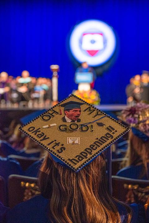 This grad's headgear takes a comedic turn, while affirming that her achievement is far from just another day in "The Office."