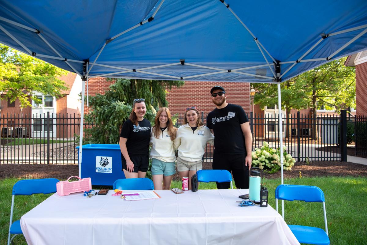 Welcoming new students to The Village (from left): Sophia G. Wiest, residence life coordinator, upper-level students; and RAs Brooke LeeAnn Brinker, Kylee P. Albert and Frank Anthony Orzehoski. 