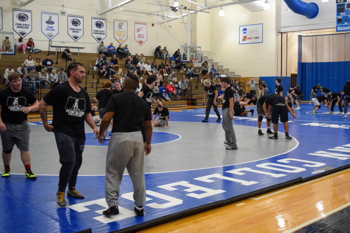 Moved into Bardo Gymnasium by the weather, an open-to-the-public Wildcat wrestling practice was no less attended ...