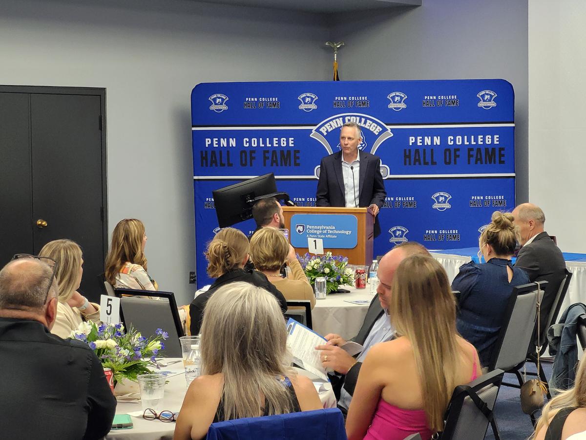 "You were players that your coaches relied on, and your teammates and campus community looked up to," said the president, welcoming the 47th and 48th members into an exclusive and prestigious club. "Tonight, you become Hall of Famers that coaches will refer to, and current and future Wildcats will aspire to become."