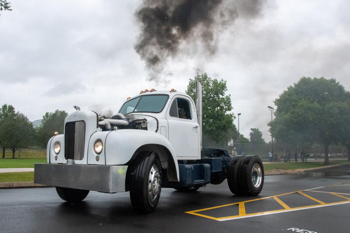 The diesel drag truck, a project for students since 2000, makes an appearance on campus after participating in an off-campus car show that supported suicide prevention. Inside are TJ Buck, treasurer of the Diesel Performance Club, and Marcayla M. Lutzkanin, club president. Buck, of Warminster, is studying diesel technology. Lutzkanin, of Port Carbon, earned degrees in 2022 in diesel technology and heavy construction equipment technology: Caterpillar equipment emphasis and is pursuing a bachelor’s in applied