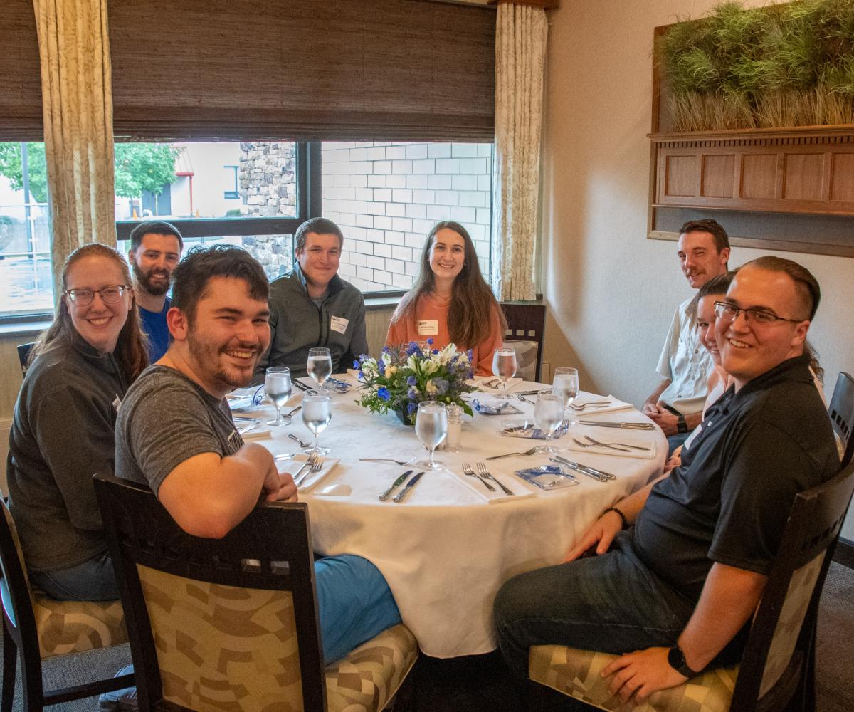 Gathering for dinner in Le Jeune Chef Restaurant are (from left): Ashley (Hoffer) Hammond, ’22; Wesley McCray, ’22; Mathew Hammond, ’23; Josh Rosenberger ’21; Rebecca High ’22; Stephen Brodecki ’22; Alli Ault (partially obscured); and Daniel Wright ’22.