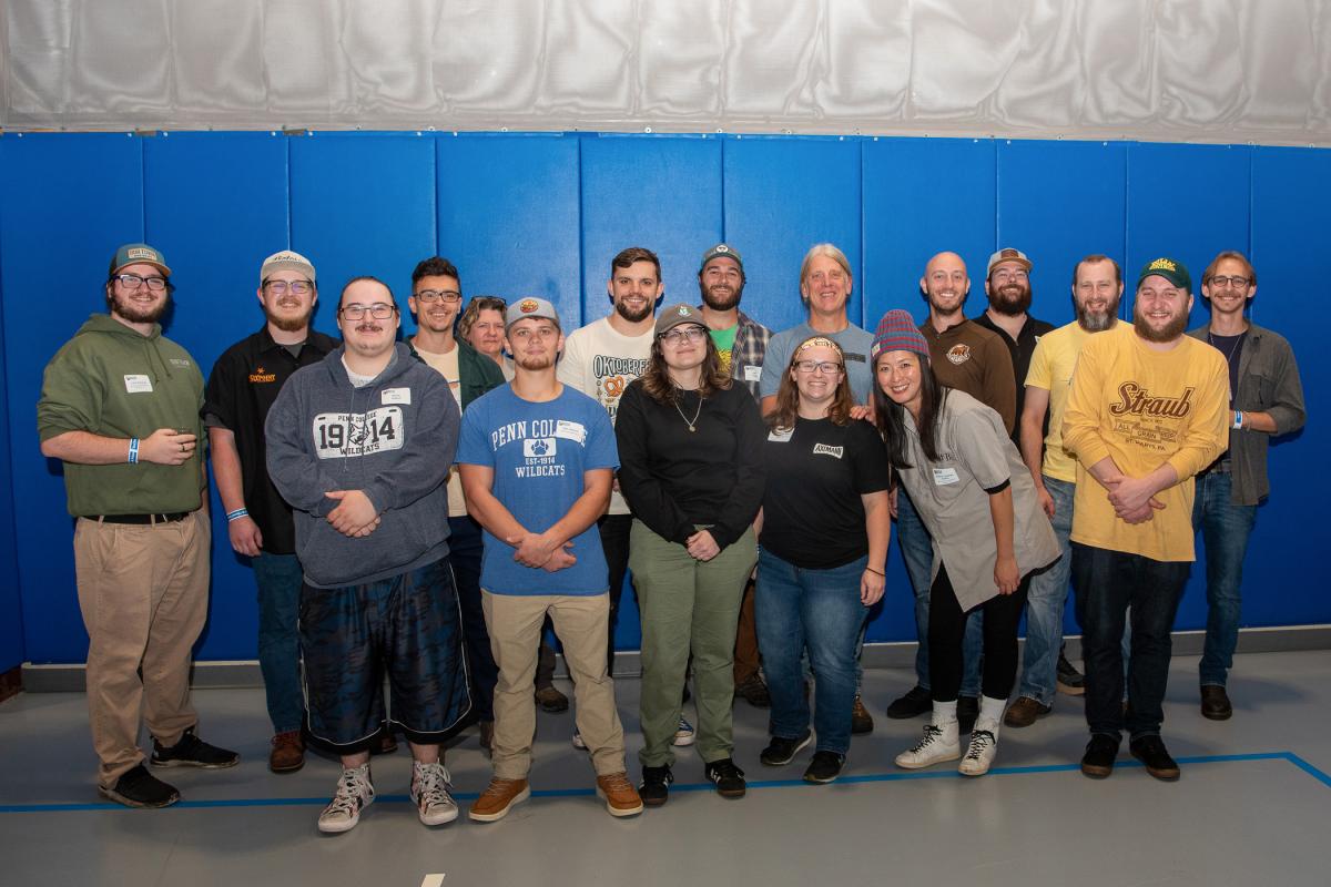 The celebrities of the evening: brewing & fermentation science alumni and their instructor Timothy J. Yarrington (at back in gray T-shirt). 