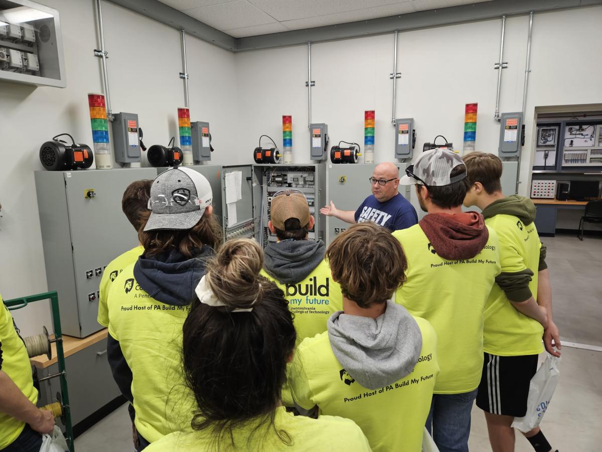  Enlightening a group of Sullivan County High School students in an electrical lab is Eric L. Anstadt, instructor of electrical technology/occupations.
