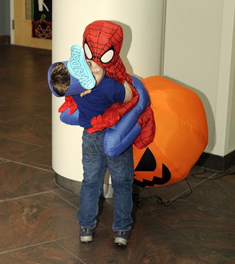 This boy's superpower? Hugging, of course!
