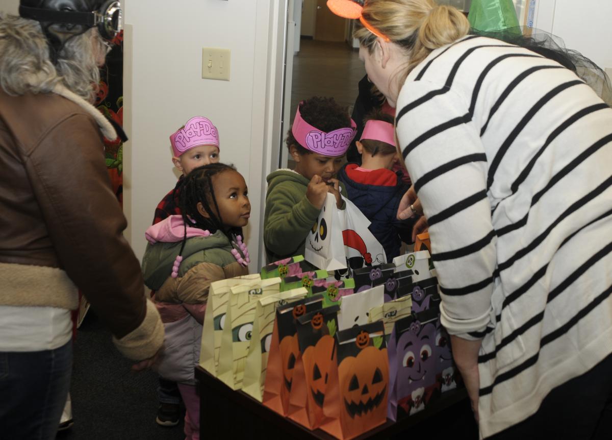 ... where Lori E. Pepperman (left) coordinator of educational loan programs, and Jessica S. Hunter, director, were among those distributing goodie bags.