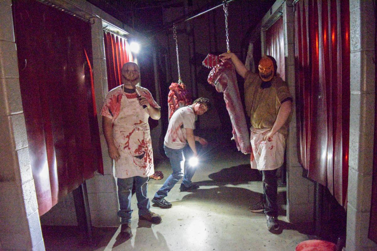 The welding bays take on a sinister slaughterhouse vibe as evening falls.