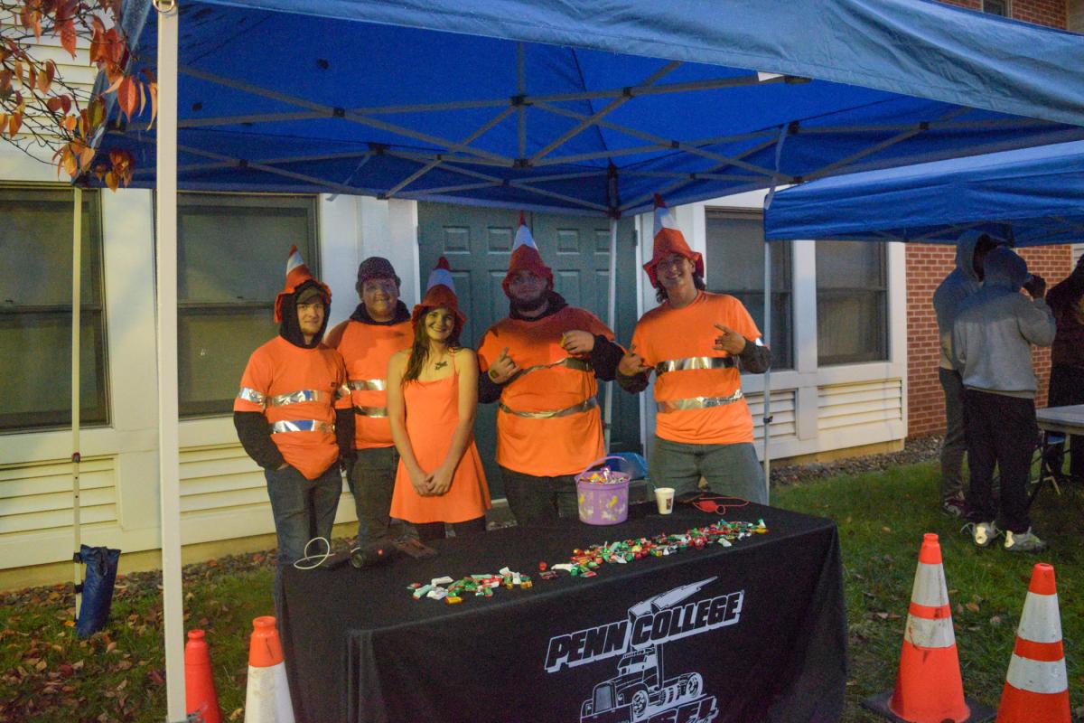 Safety first! The Penn College Diesel Performance Club turns a traffic cone-inspired look into a fashion statement – reflective stripes included.