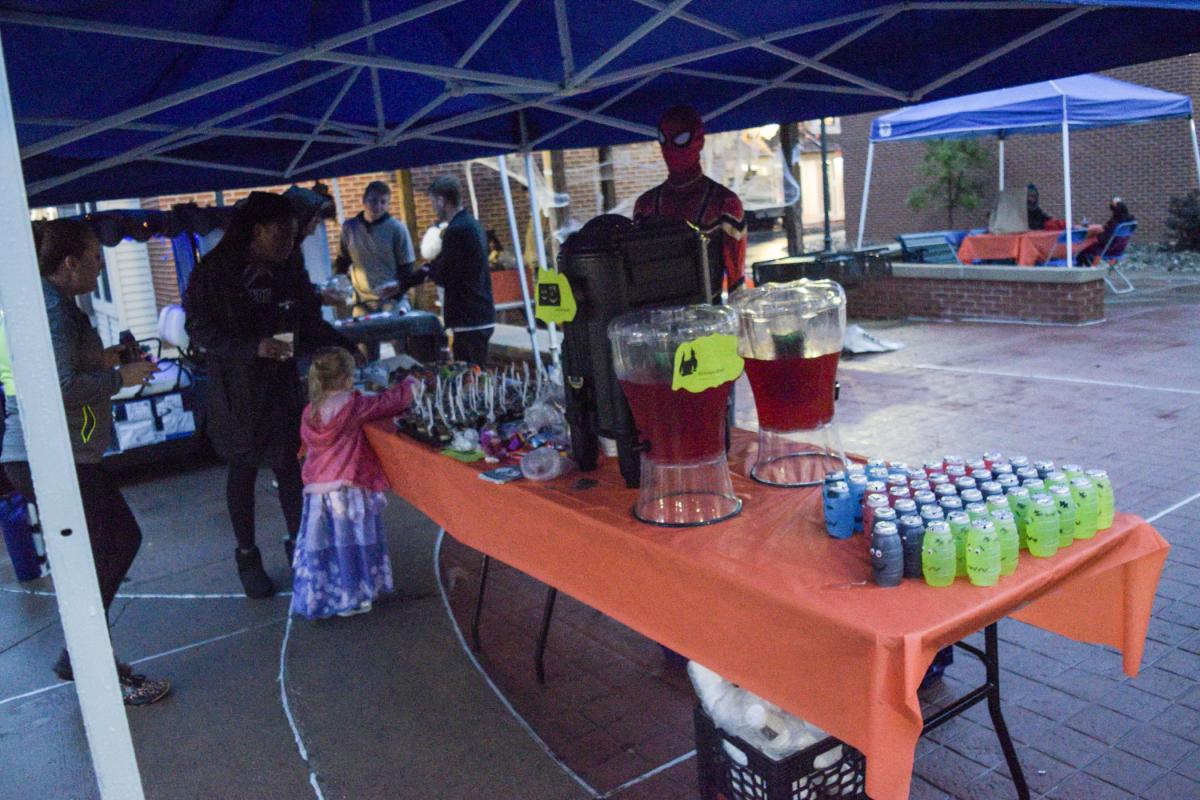 Spider-Man staffs a snack table, luring attendees into a web of goodies.