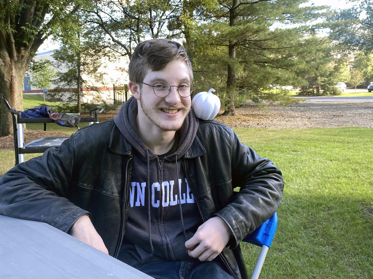 With a smile that lets the world know that's NOT a chip on his shoulder, Addison J. "A.J." Smith, of Montoursville, enjoys the midweek evening. Smith is enrolled in the college's new biomedical sciences major.