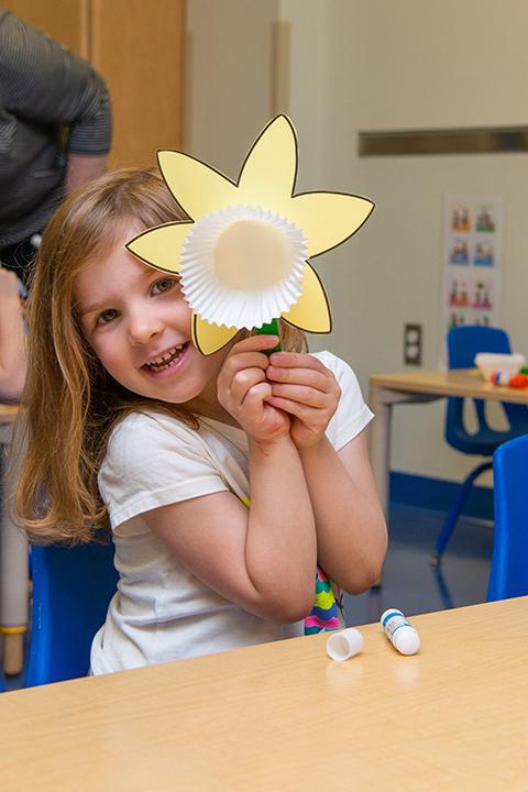 A child shows off her handiwork in Pennsylvania College of Technology’s Dunham Children’s Learning Center. The center received a Child Care Access Means Parents in School grant from the U.S. Department of Education to help lower child care costs for eligible students, based on income.