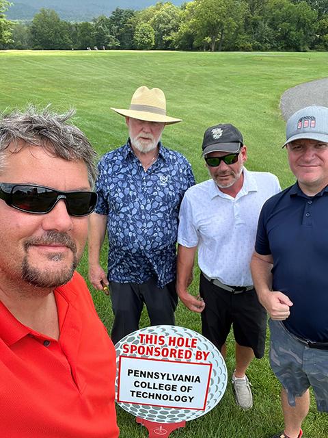 From left are Garret L. Graff, assistant professor of building construction technology; Bernard A. Kahn III; Bernard A. Kahn IV, instructor of building construction technology; and Bryan Waltz.