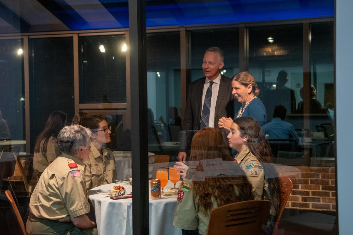 The honorees converse with Scouts and Scout leaders during the reception.