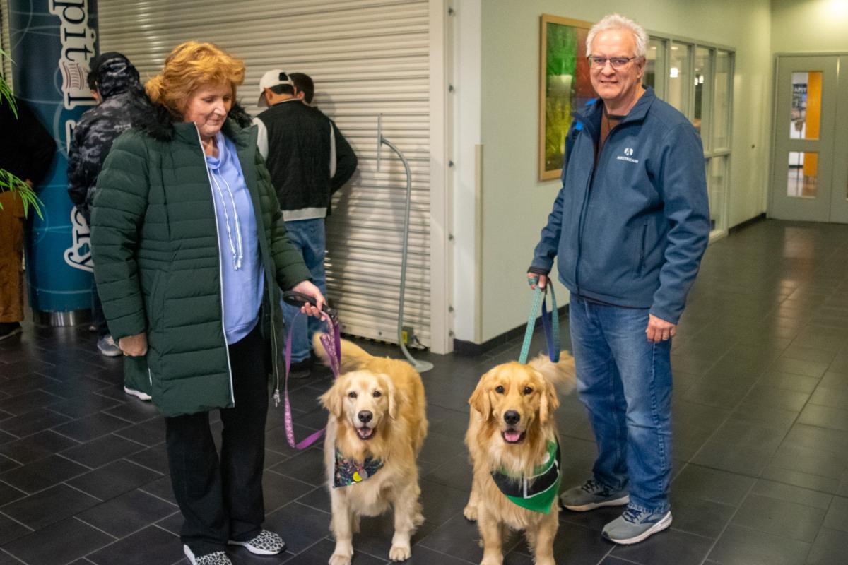Tanya and Drew R. Potts (assistant professor of civil engineering technology) brought their therapeutic tag team of Indy and Winnie to spark smiles and lower everyone's blood pressure.