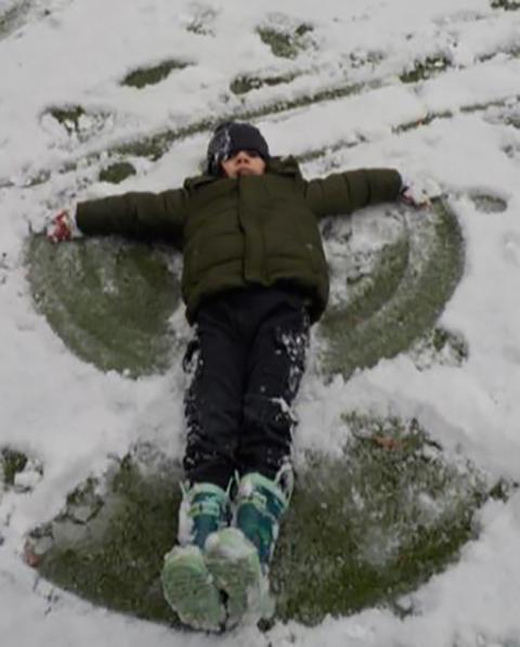 A snow angel alights on the CLC play area.