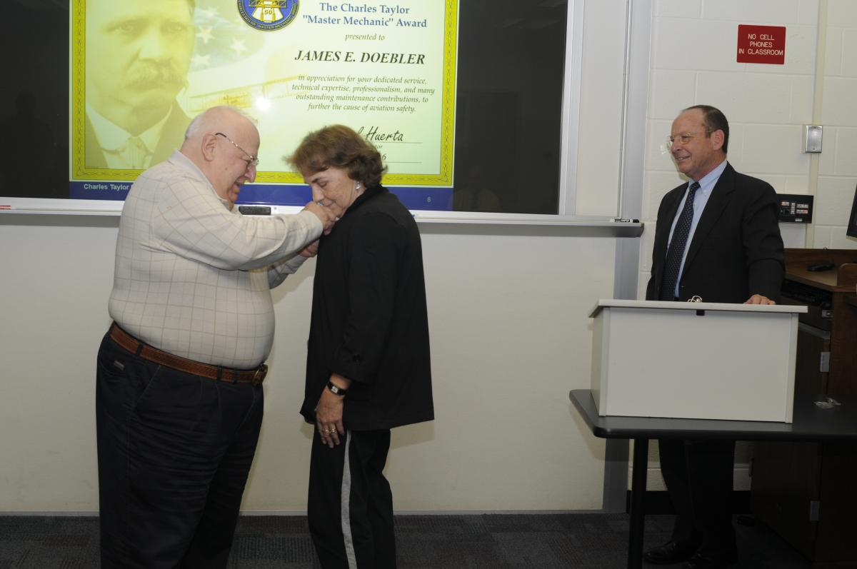 The ceremony included a pin for Doebler's wife of 46 years.