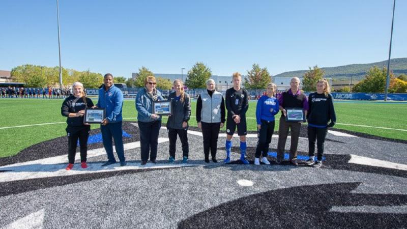 Penn College soccer players presented the college’s corporate partners with framed collages recognizing their support of UPMC Field and the enhanced athletic complex.
