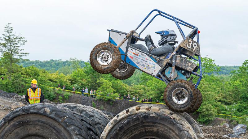 The Penn College car, driven by Isaac H. Thollot, gets air on the suspension and traction course. Penn College came in fourth in the event.