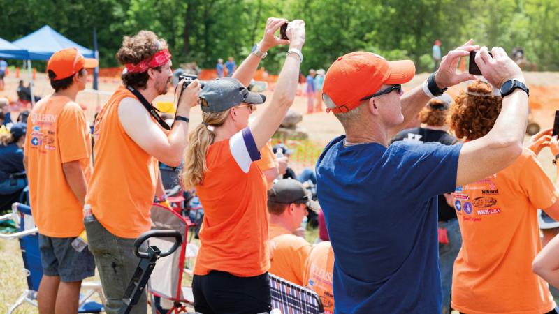 Clemson fans record the moment.