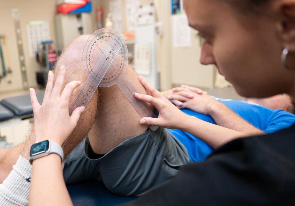 physical therapist student at work in lab