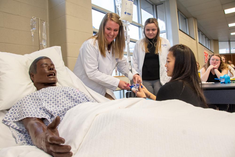 nursing students engaged in capstone presentations