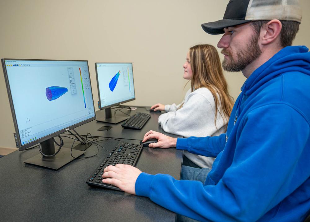 two students at work on computers