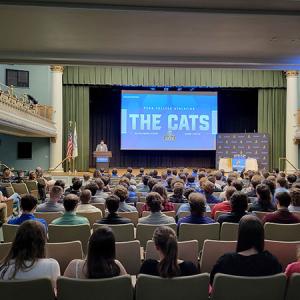 Sunday's steady rain didn't deter attendance, as a roomful of student-athletes listens to Blymier's recitation of the year's many highlights.