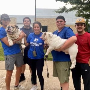 Happiness by the handful! Students enjoy the ample company of Groucho and Meatball, electrical technology/occupations instructor Eric L. Anstadt's pair of English bulldogs. From left are Gavin M. Ulsh, of Hummelstown, electrical technology; Edwin Villanueva Jr., Philadelphia, residential construction technology & management; Kayla A. Weinizierl, Summerhill, bachelor of architecture; Elijah J. Moyer, Quakertown, aviation maintenance technology; and Mason A. Cooper, engineering CAD technology.