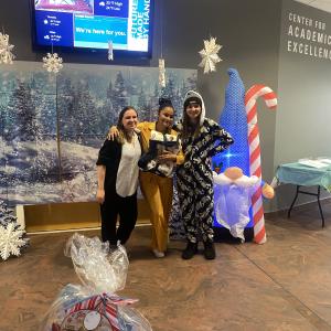 The SGA officers celebrate with another winner: Kaylena L. Harrell, a graphic design student and marketing assistant – who also provided photos from Wednesday's event.
