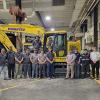 Anderson Equipment Co. representatives join Pennsylvania College of Technology students and faculty in a Schneebeli Earth Science Center lab, marking the company's entrustment loan of a Komatsu PC 138 excavator.